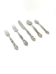 flatware set includes spoon knife forks