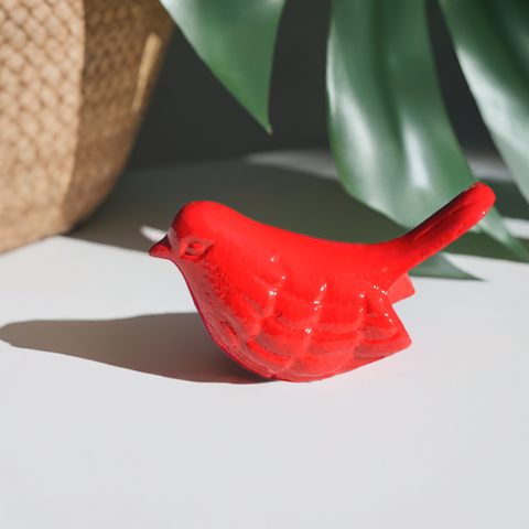 red bird figurine