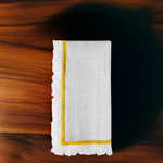 yellow and white cloth napkin for dinner table